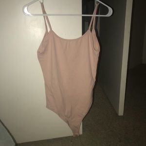 Pink body suit